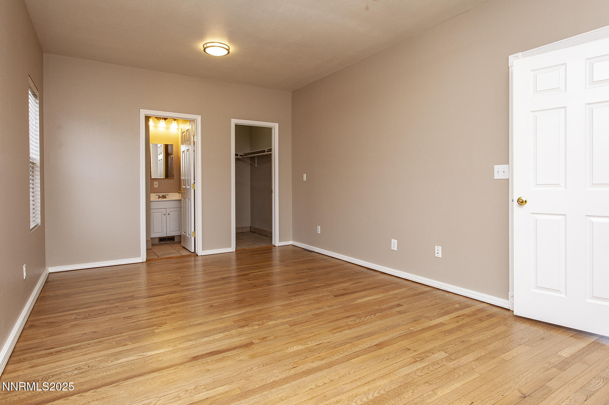 376 Wheeler Avenue Reno, NV 89502 - Photo 21 of 33 a view of an empty room with wooden floor and closet