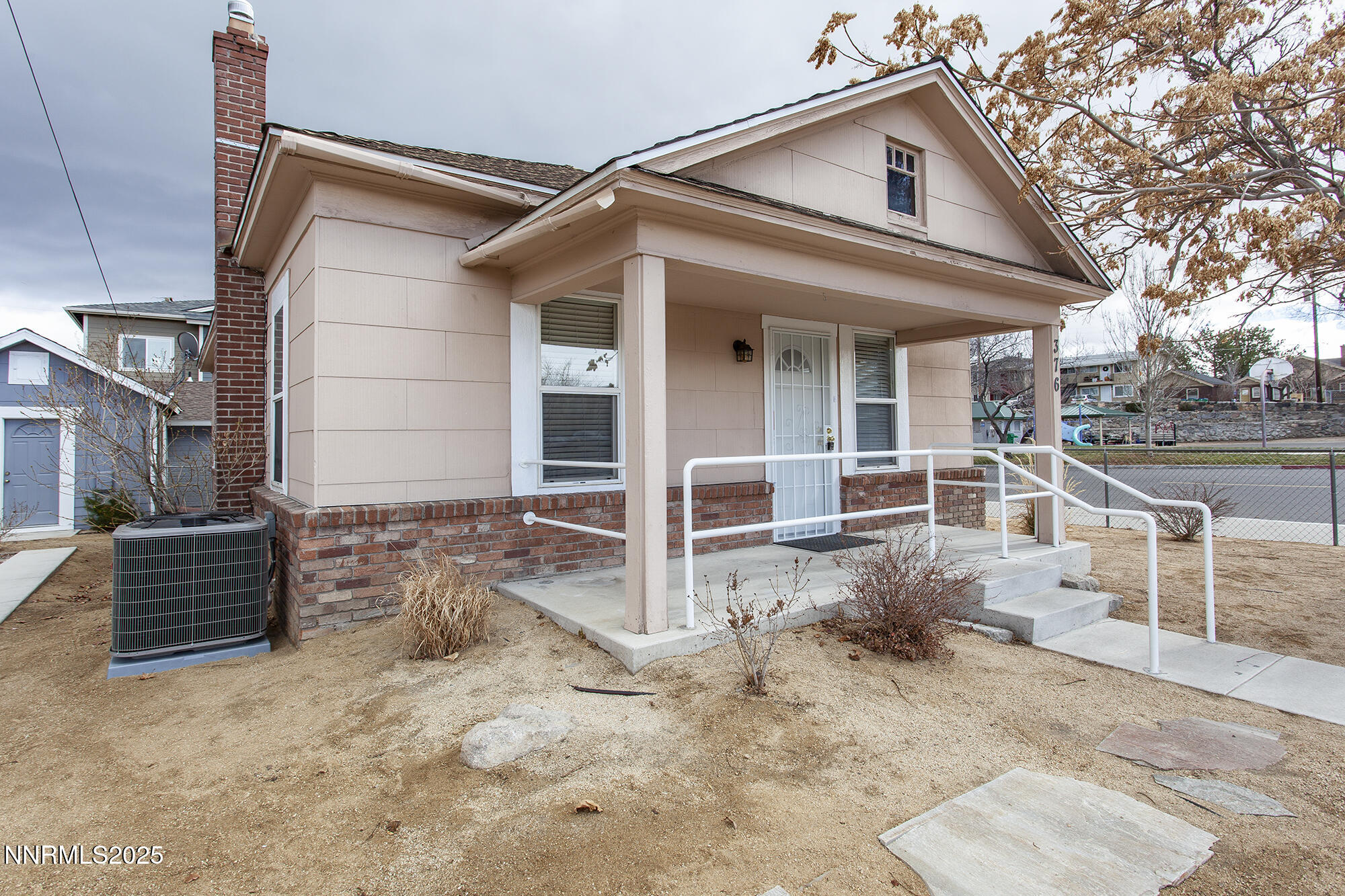 376 Wheeler Avenue Reno, NV 89502 - Photo 6 of 33 a view of a house with wooden walls and stairs