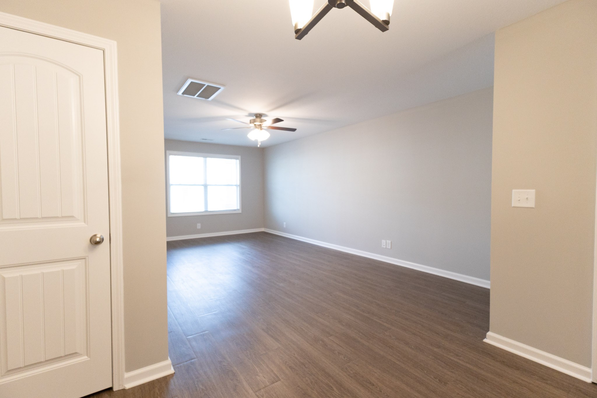 118 Davis Ridge Lane Clarksville, TN 37040 - Photo 13 of 35 wooden floor in an empty room with a window