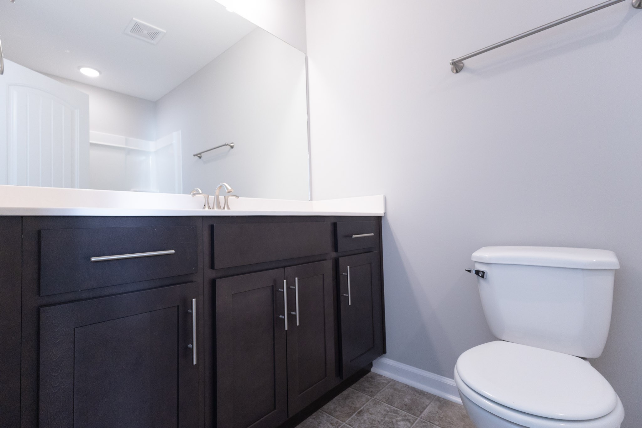 118 Davis Ridge Lane Clarksville, TN 37040 - Photo 18 of 35 a bathroom with a toilet a sink and mirror