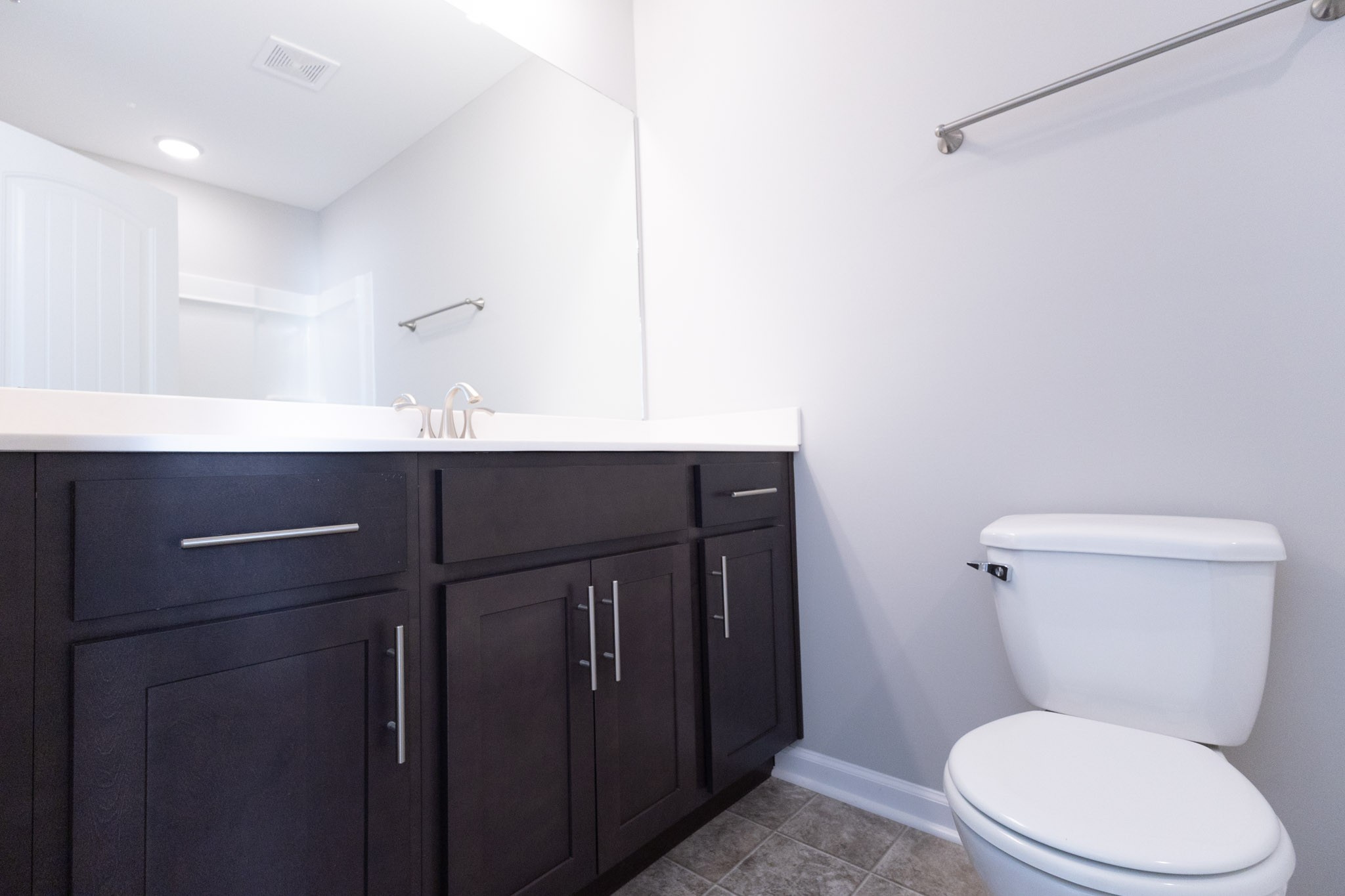 118 Davis Ridge Lane Clarksville, TN 37040 - Photo 19 of 35 a bathroom with a toilet a sink and mirror
