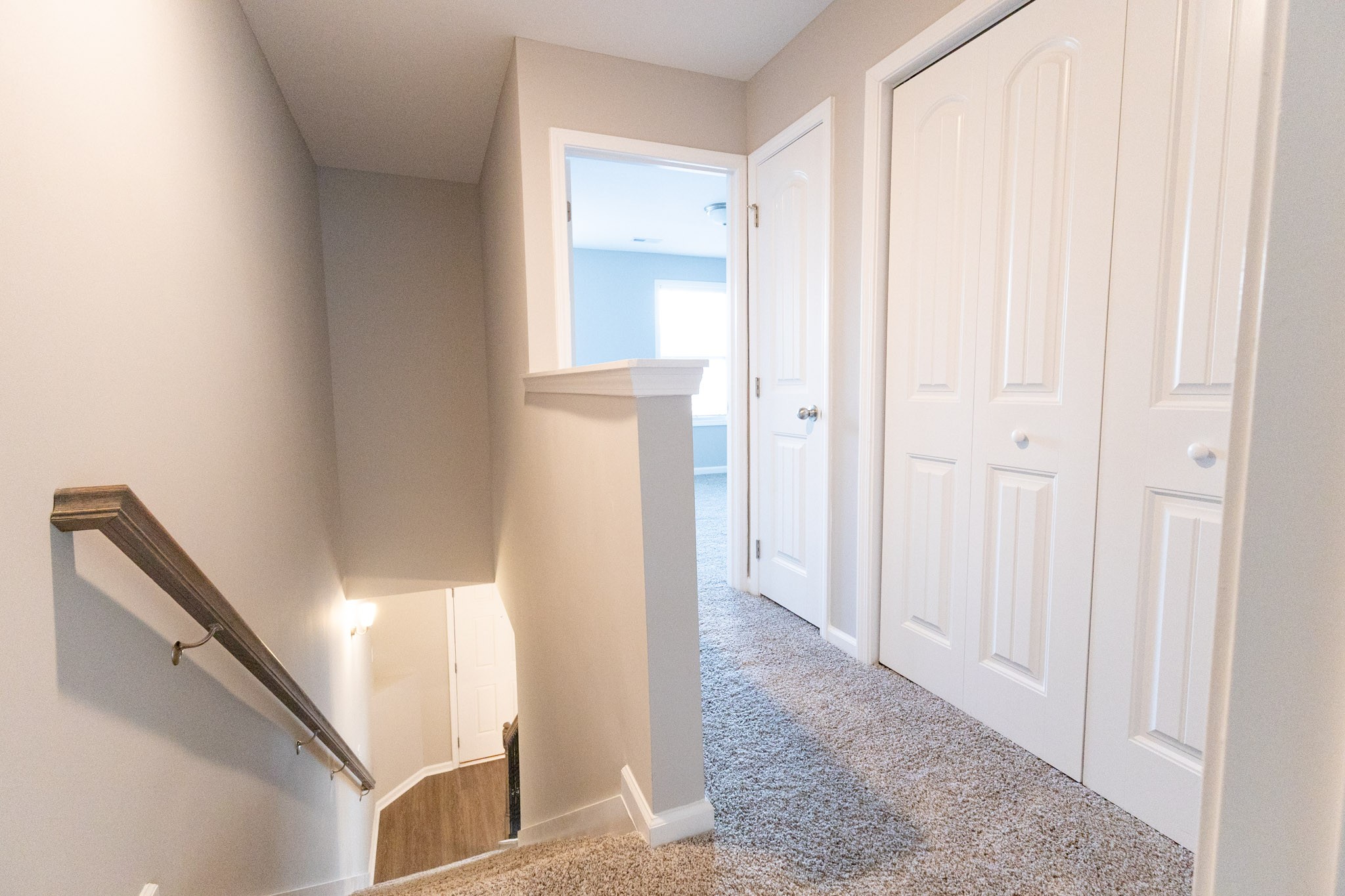 118 Davis Ridge Lane Clarksville, TN 37040 - Photo 23 of 35 a view of a hallway with white walls and stairs