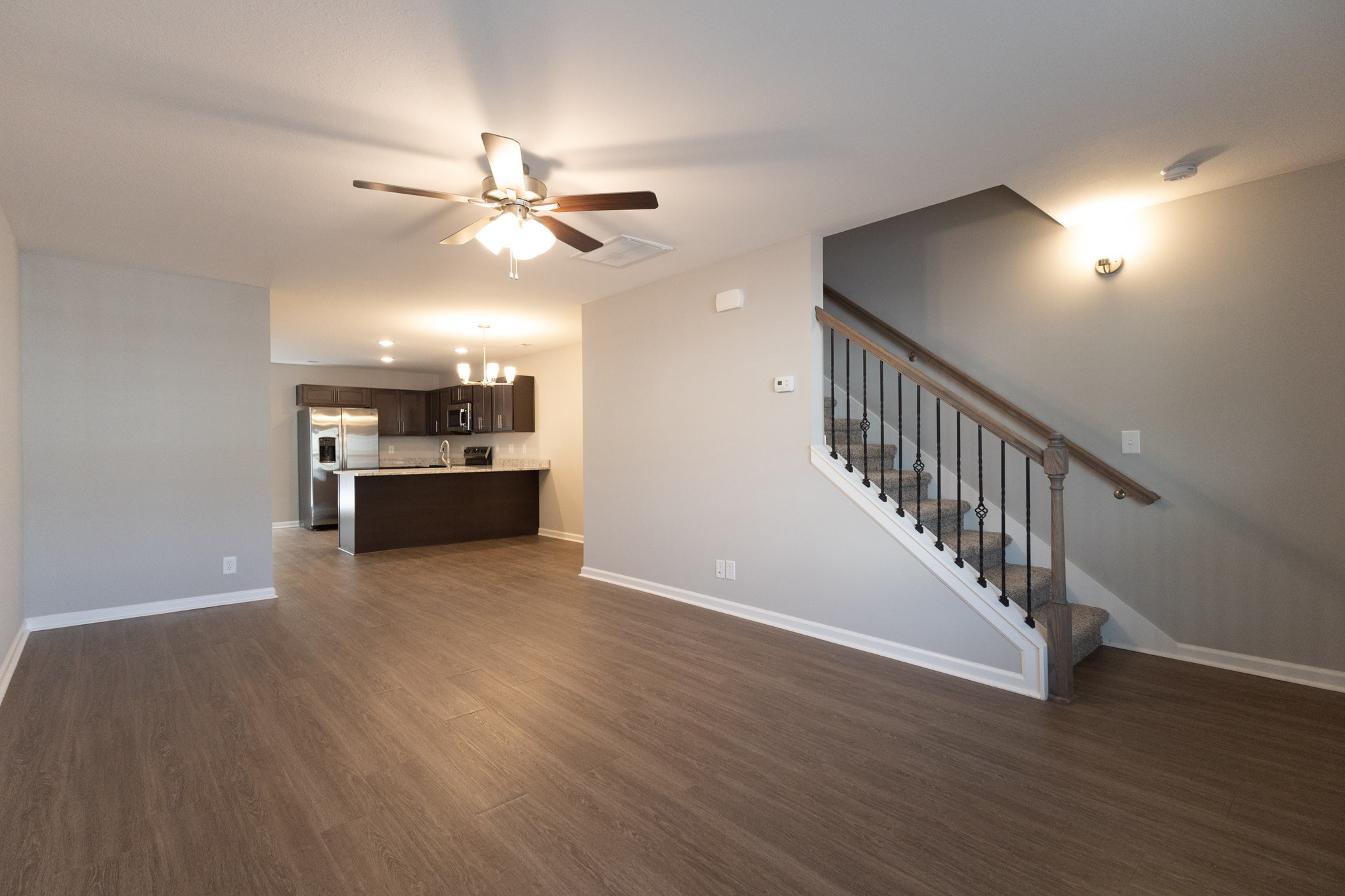118 Davis Ridge Lane Clarksville, TN 37040 - Photo 7 of 35 a view of a livingroom with a ceiling fan and hardwood floor