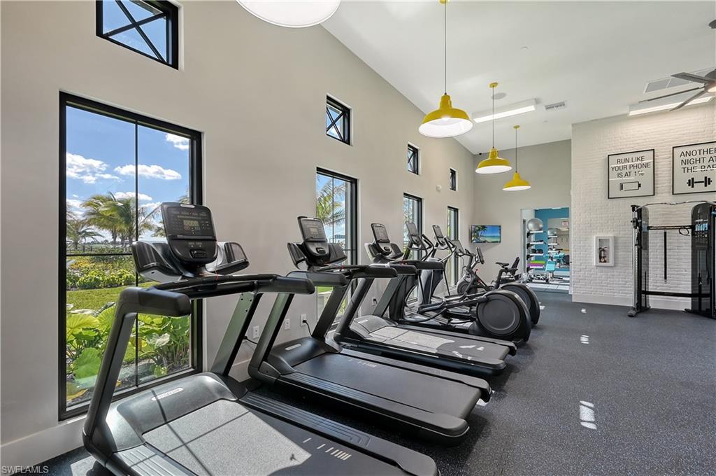 4551 Centaurus Circle Naples, FL 34120 - Photo 26 of 26 a view of a room with gym equipment
