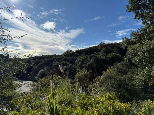 a view of a house with a street