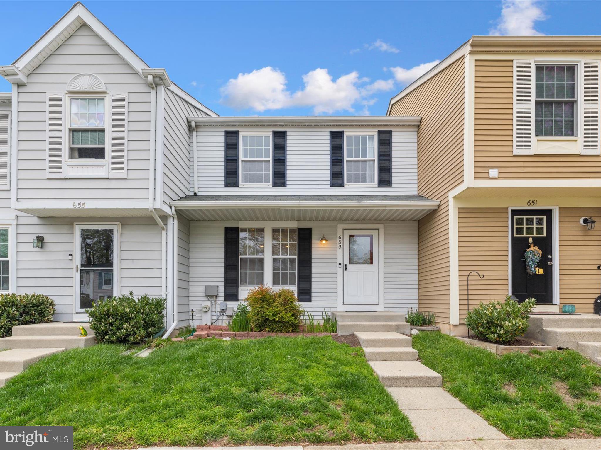 653 Willowby Run Pasadena, MD 21122 - Photo 1 of 31 a front view of a house with garden