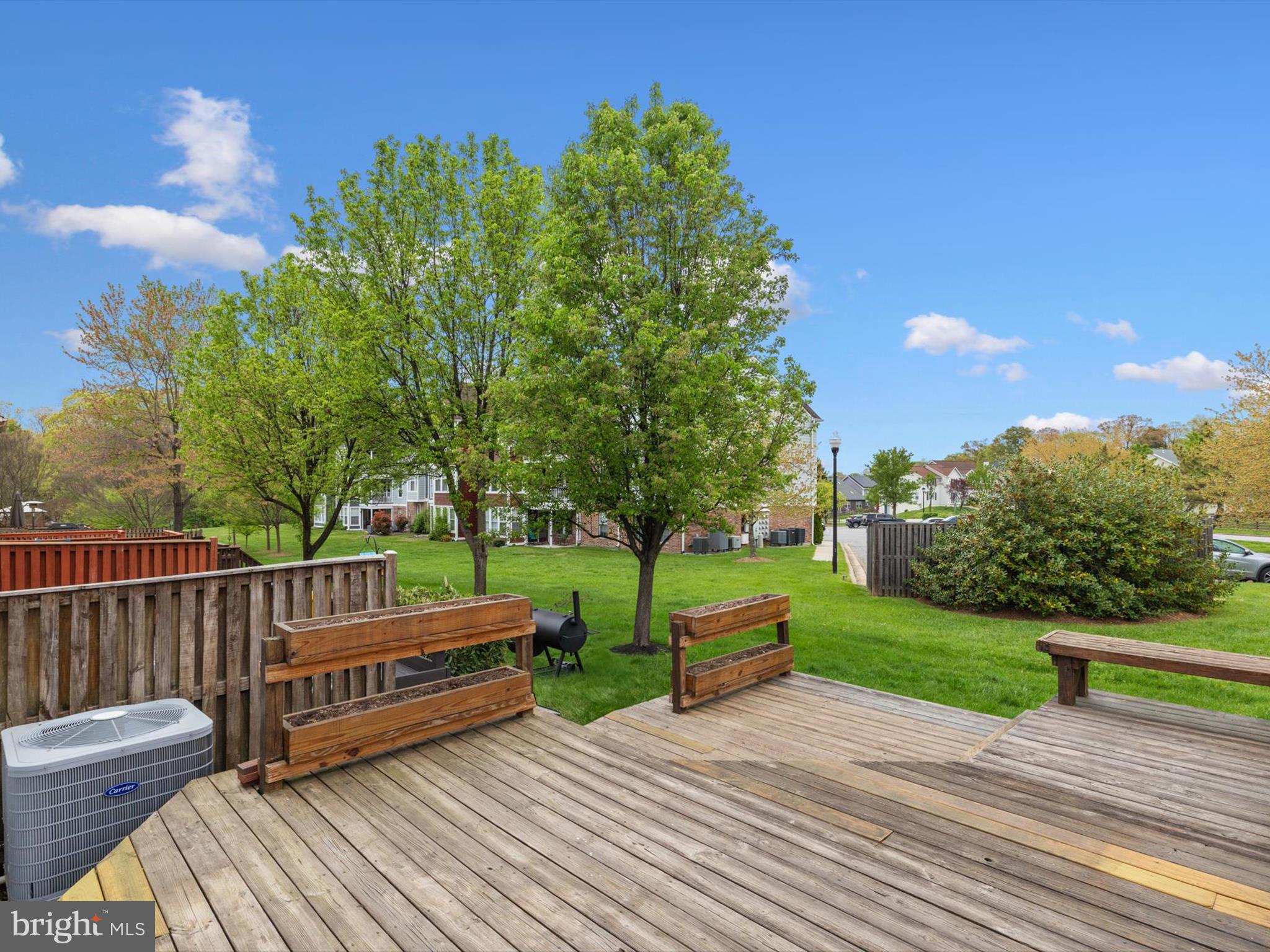 653 Willowby Run Pasadena, MD 21122 - Photo 28 of 31 a view of a deck with a yard