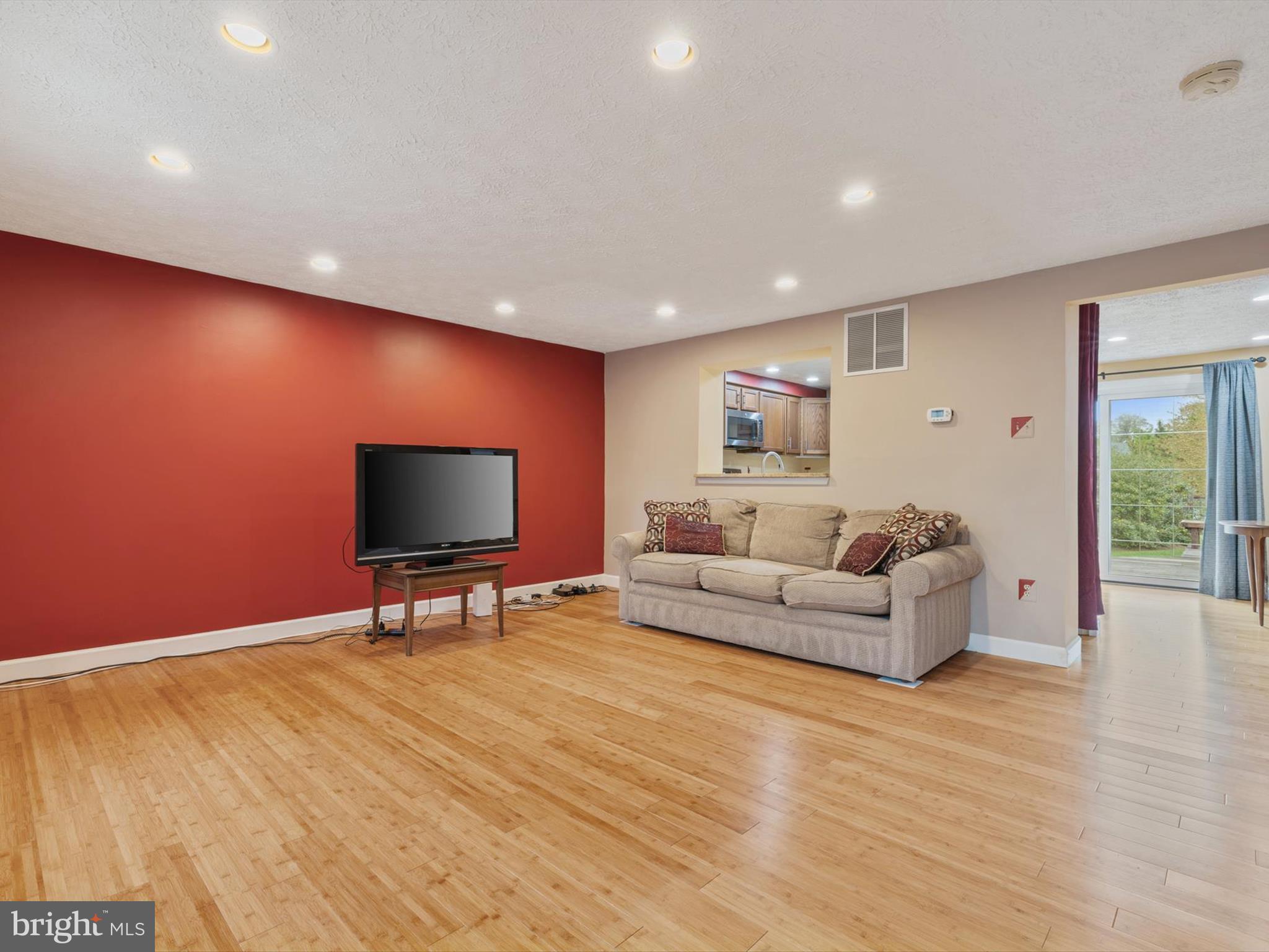 653 Willowby Run Pasadena, MD 21122 - Photo 3 of 31 a living room with furniture and a flat screen tv