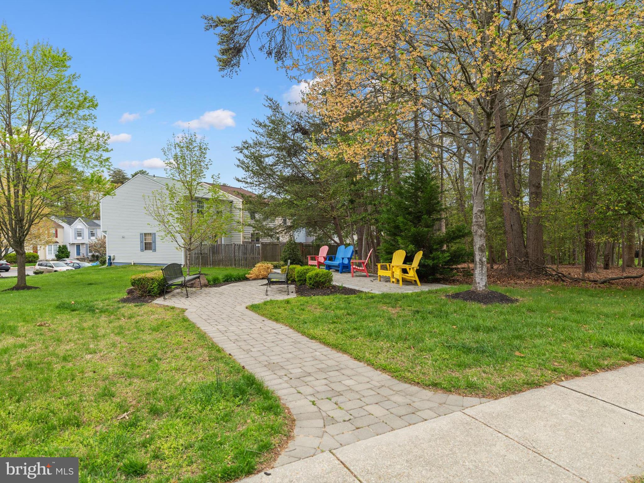 653 Willowby Run Pasadena, MD 21122 - Photo 31 of 31 a front view of a house with garden and trees