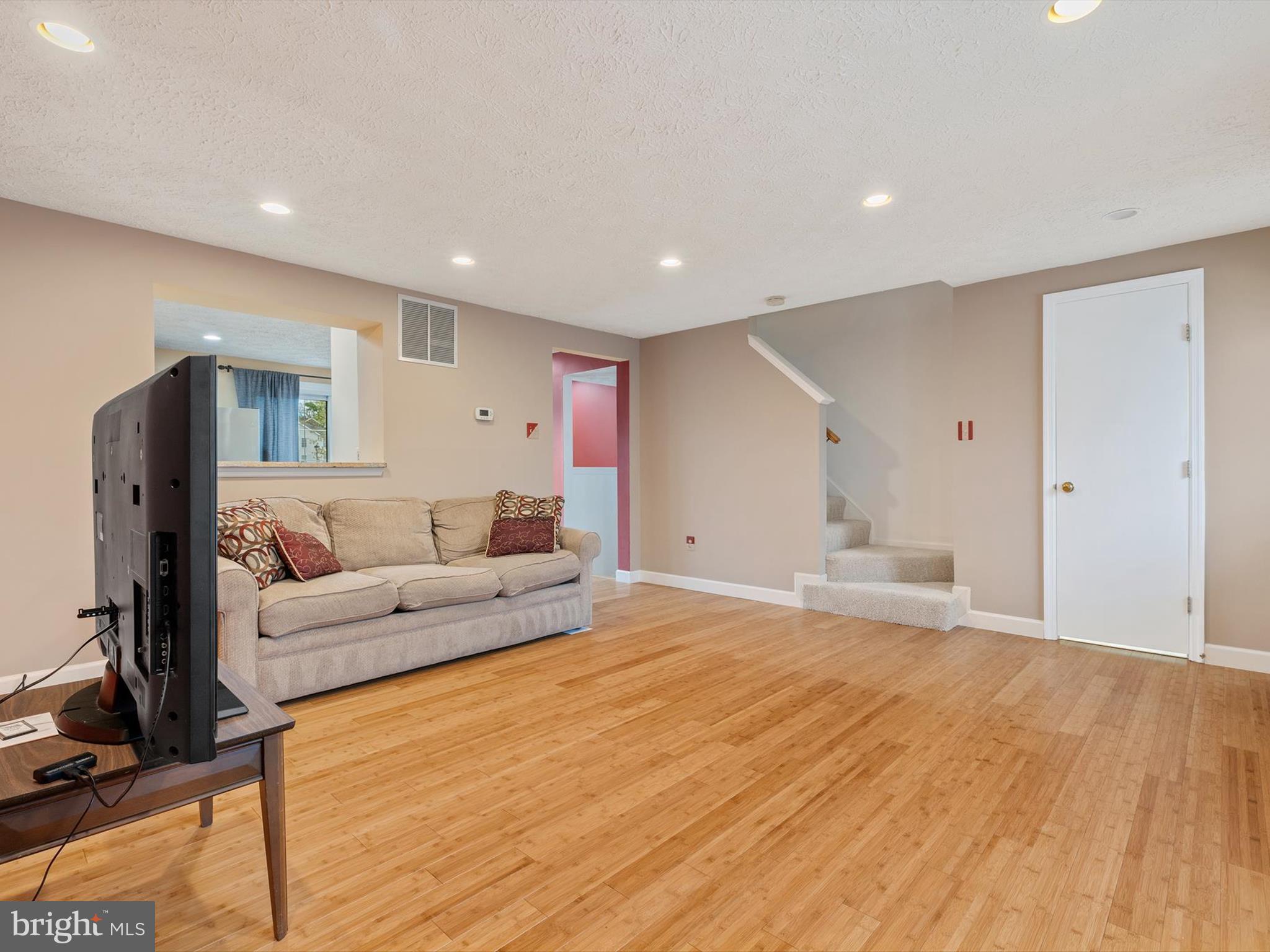 653 Willowby Run Pasadena, MD 21122 - Photo 5 of 31 a living room with furniture and a wooden floor