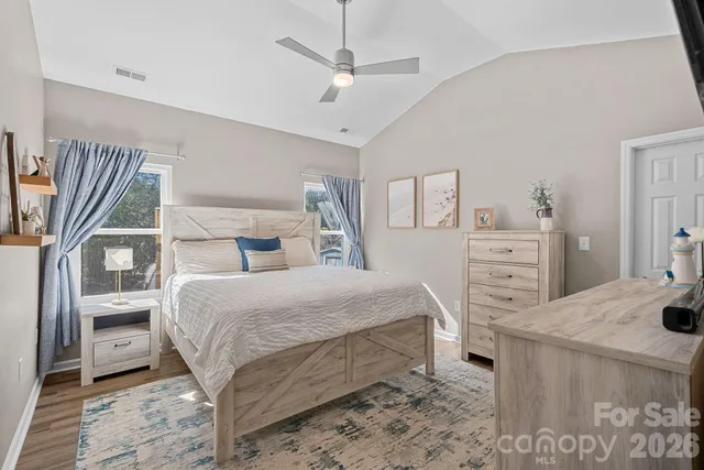 a kitchen with a stove and a refrigerator