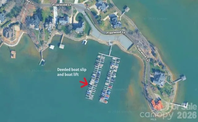 a view of entryway with a front door and wooden floor