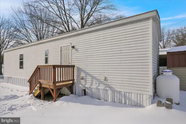a view of a chair in back of house