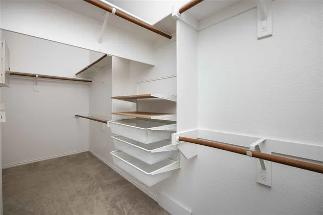 a storage room with washer and dryer