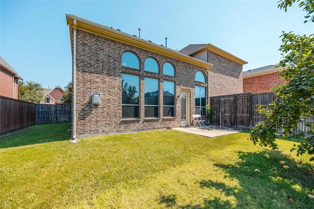 a view of a house with swimming pool and porch
