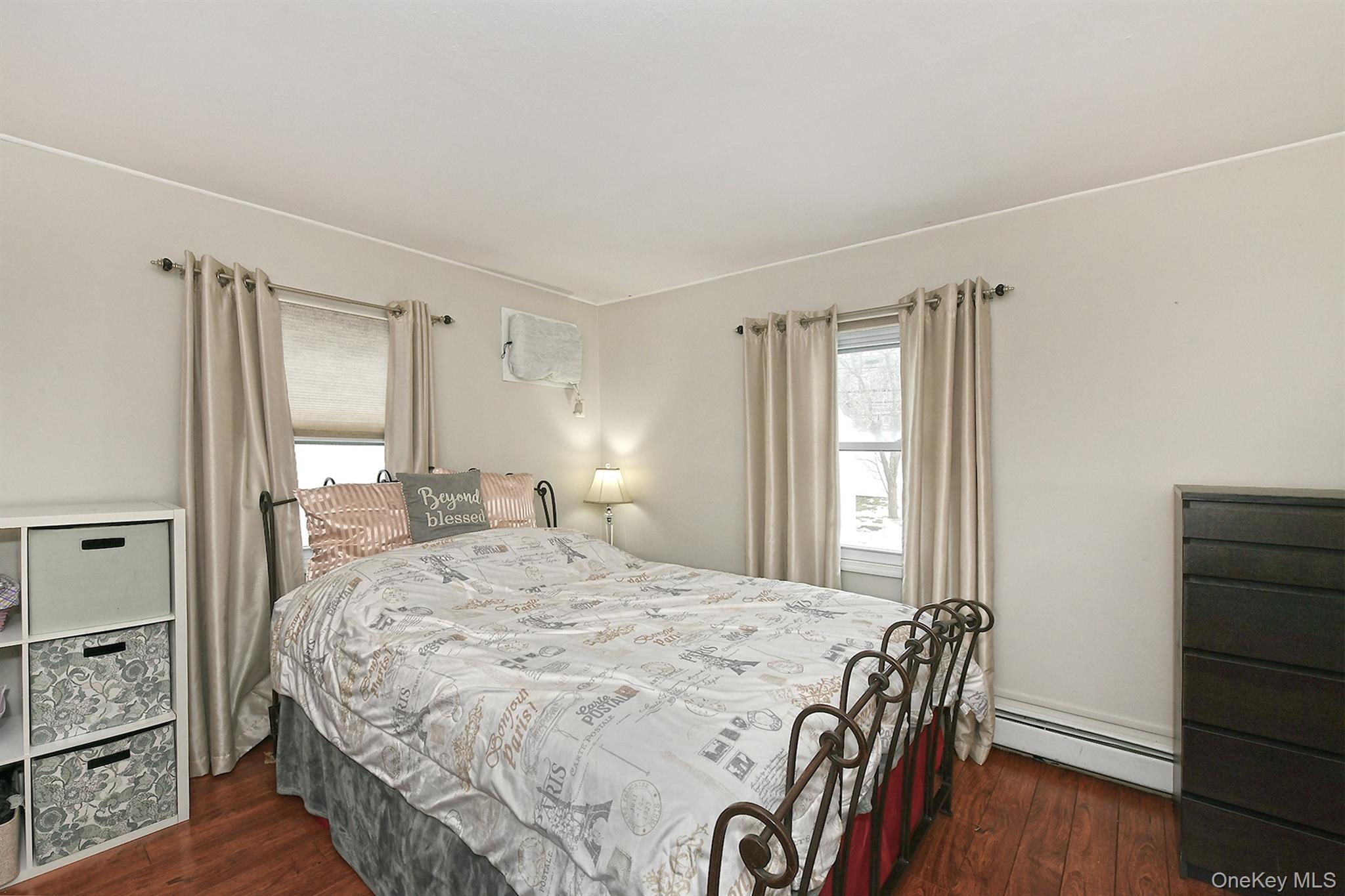 103 Ranch Lane Levittown, NY 11756 - Photo 13 of 29 a bedroom with a bed and a window