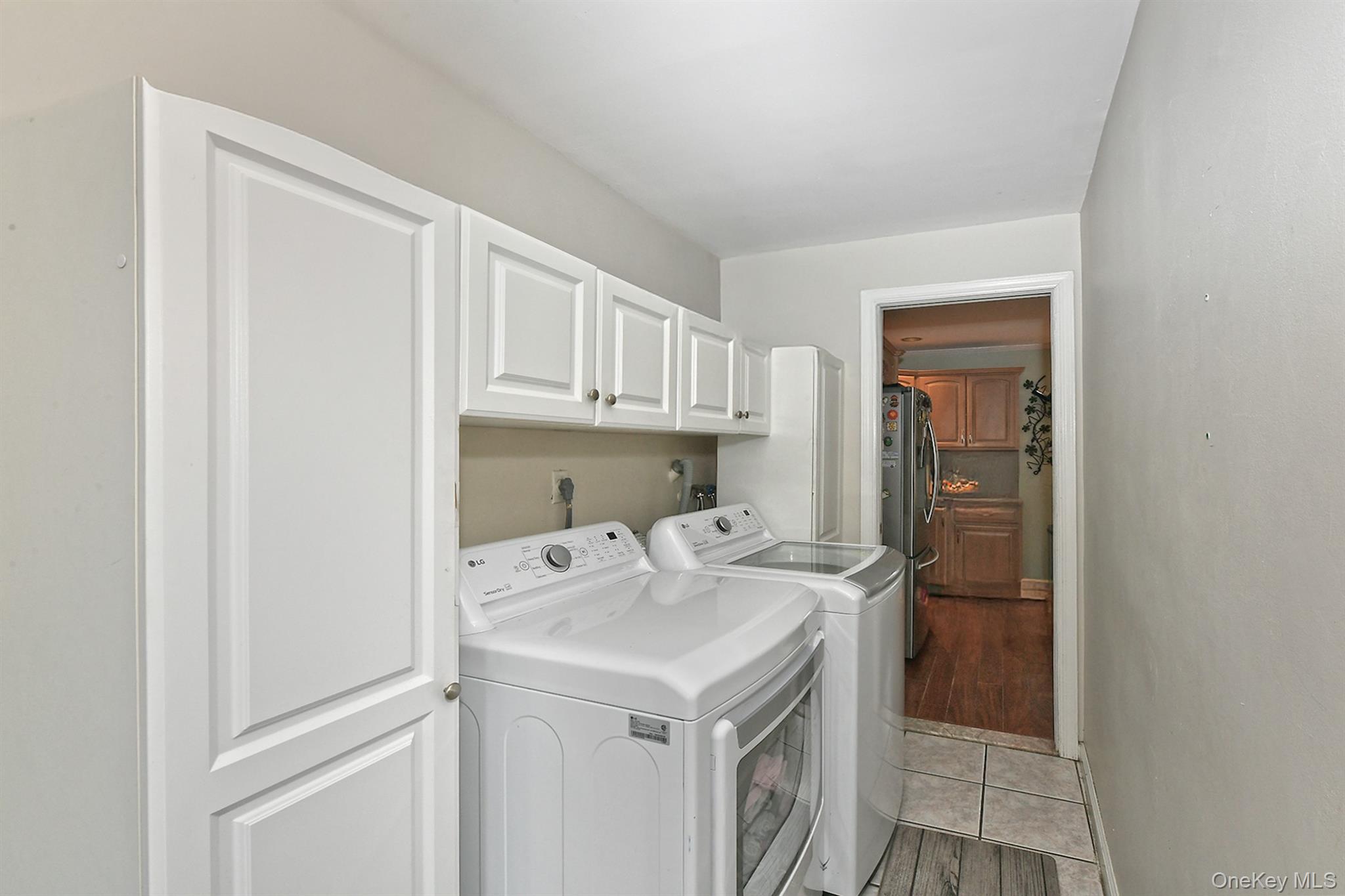 103 Ranch Lane Levittown, NY 11756 - Photo 15 of 29 a utility room with dryer and washer