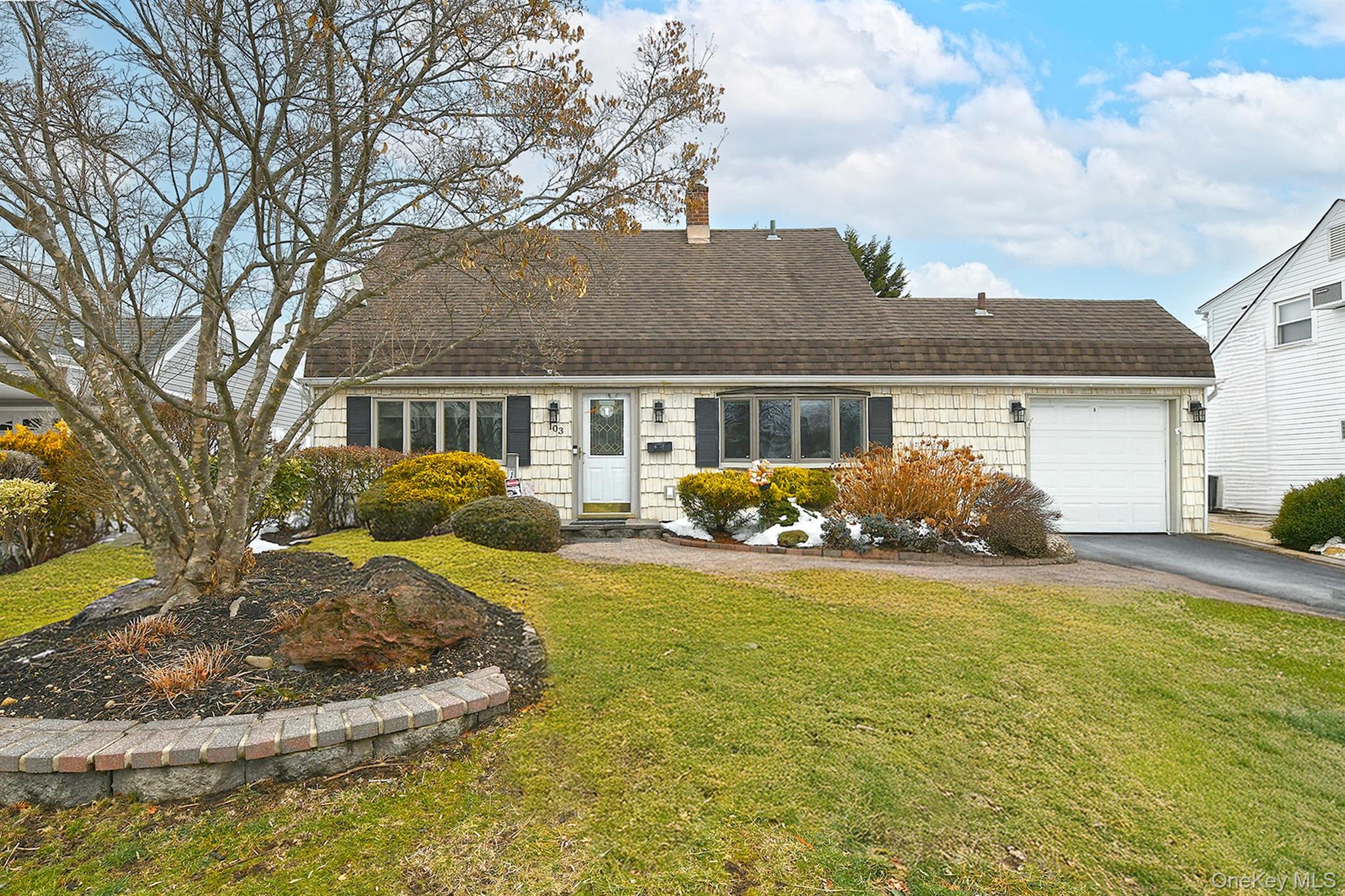 103 Ranch Lane Levittown, NY 11756 - Photo 2 of 29 a view of a house with backyard and sitting area