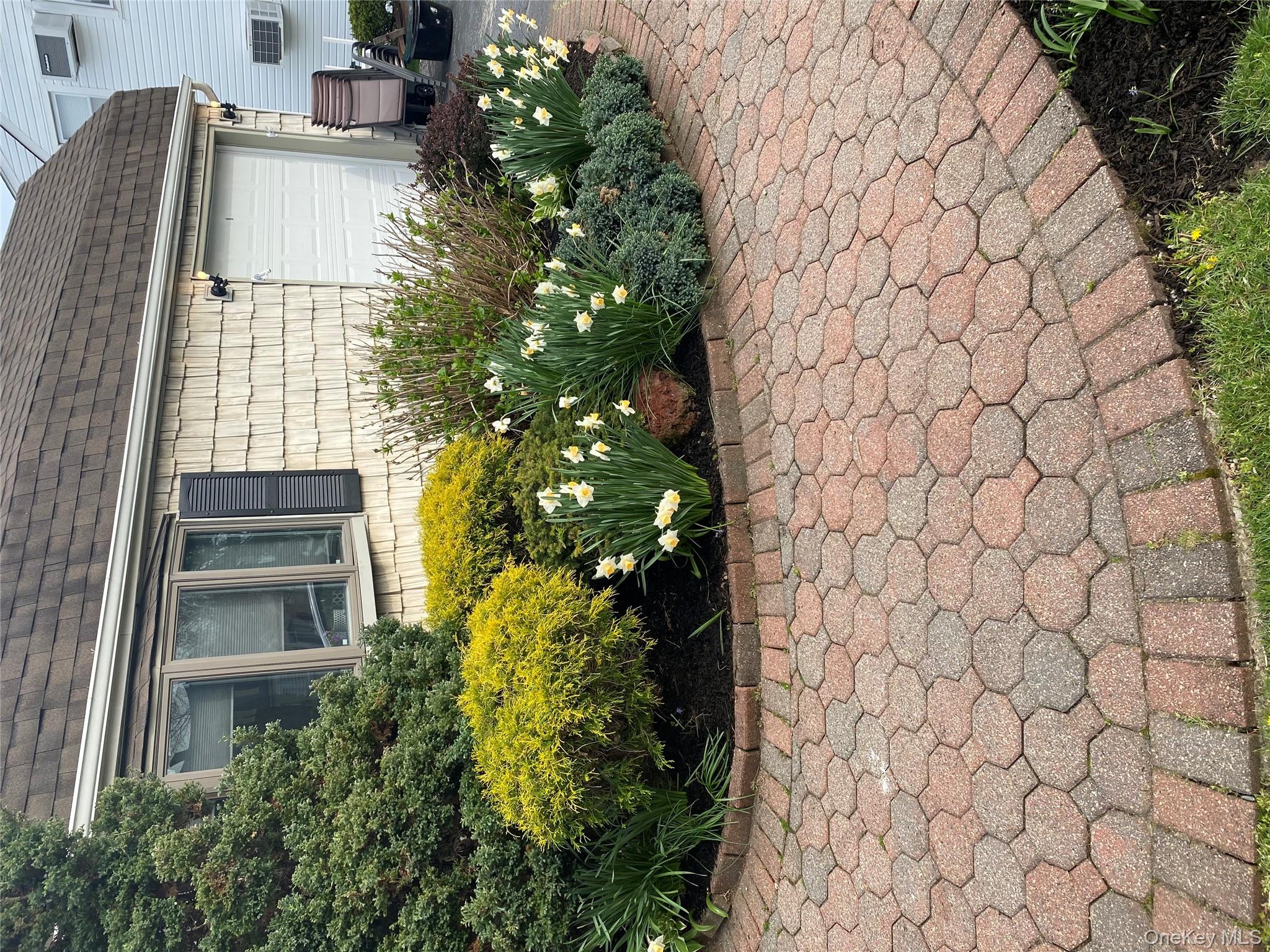 103 Ranch Lane Levittown, NY 11756 - Photo 28 of 29 a view of a backyard