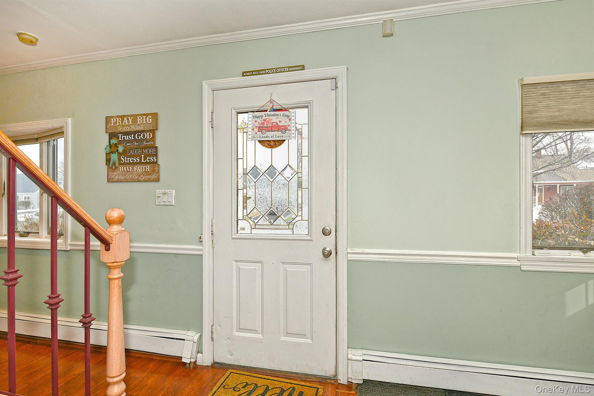 103 Ranch Lane Levittown, NY 11756 - Photo 4 of 29 a view of front door with wooden floor