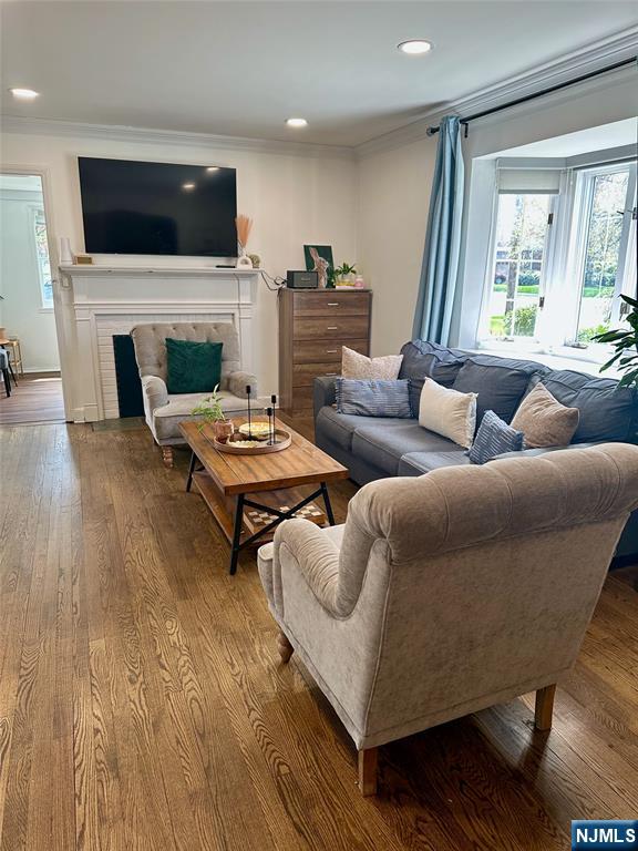 440 Bogert Road River Edge, NJ 07661 - Photo 7 of 25 a living room with furniture and a flat screen tv