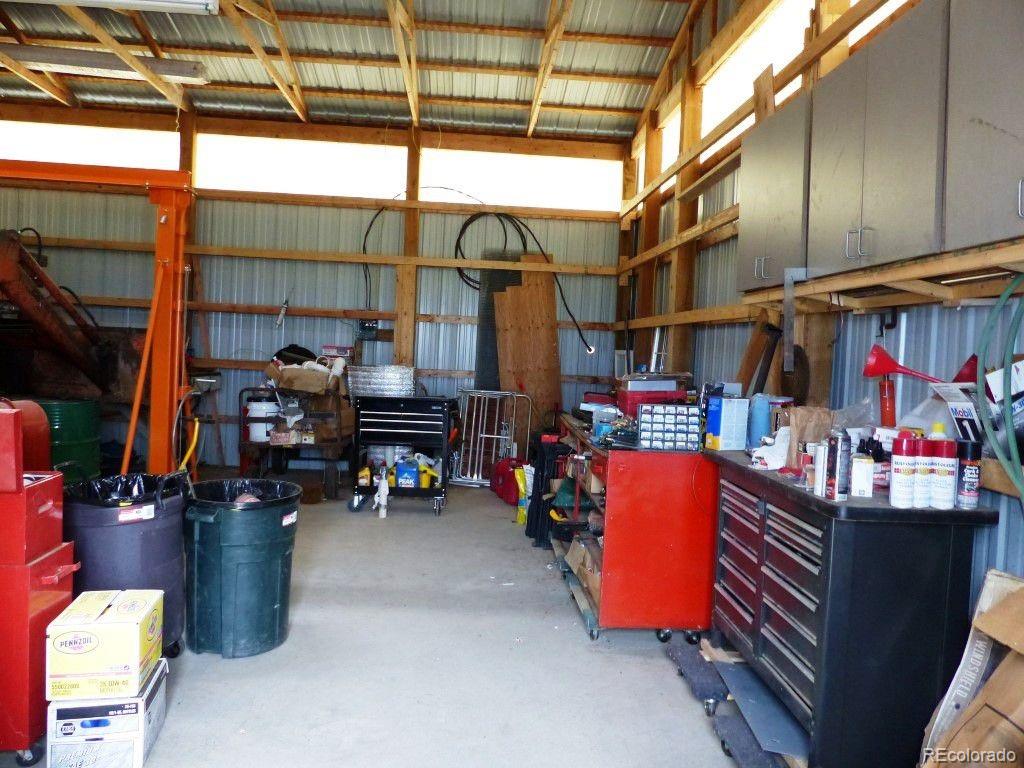 985 Prairie Road Westcliffe, CO 81252 - Photo 23 of 35 a room with musical instruments and air hockey table