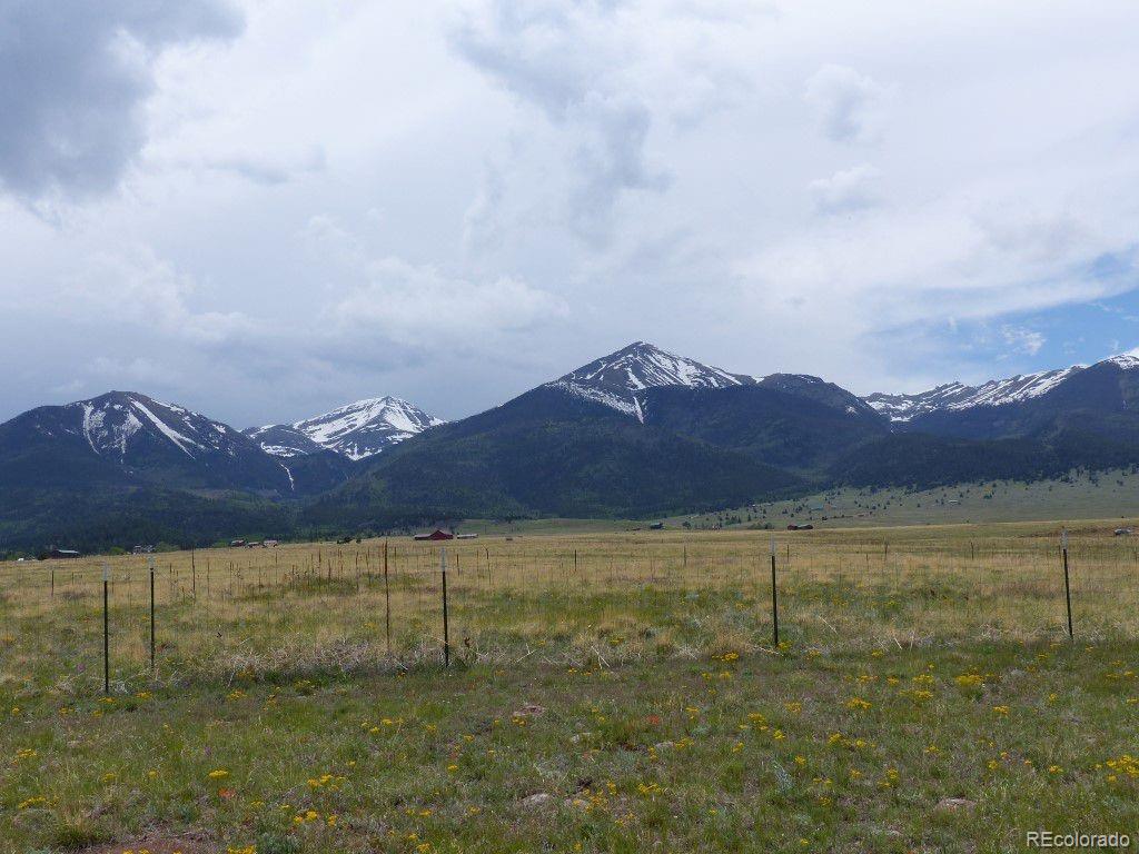 985 Prairie Road Westcliffe, CO 81252 - Photo 27 of 35 a view of an ocean with a mountain in the background