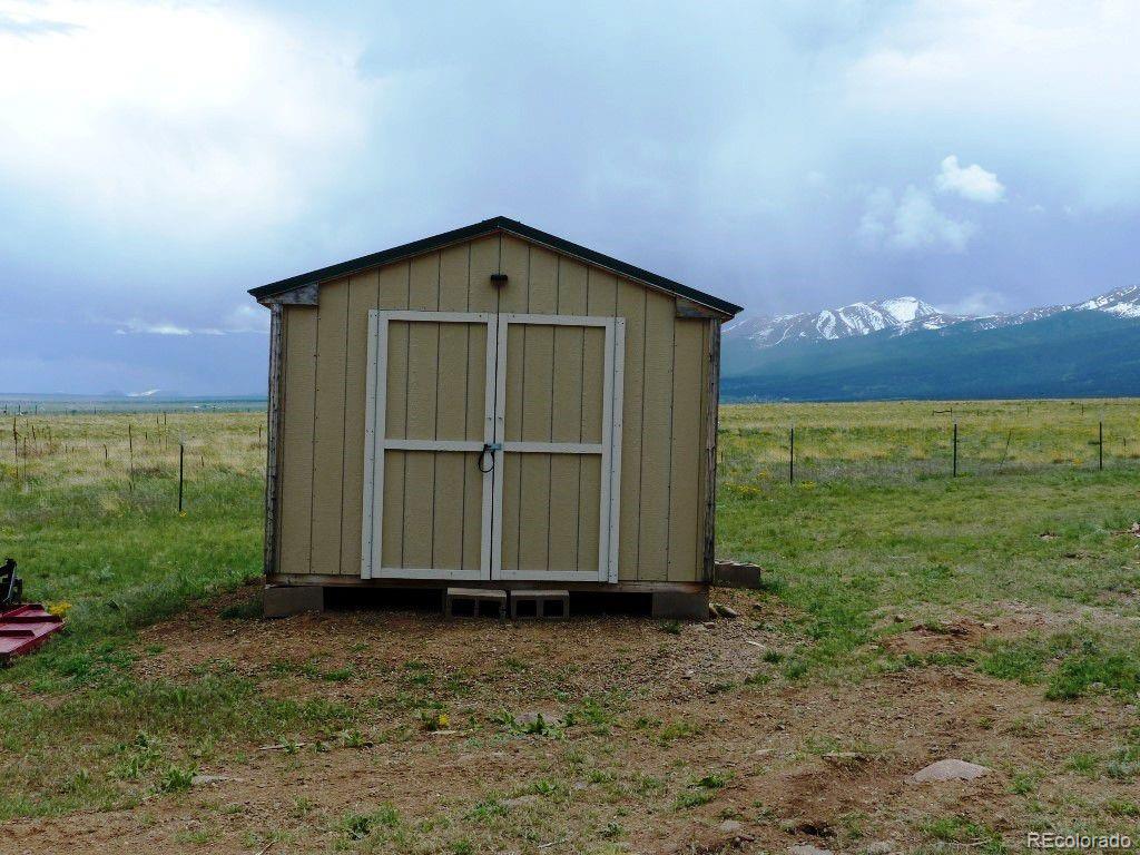 985 Prairie Road Westcliffe, CO 81252 - Photo 34 of 35 a view of a house with backyard