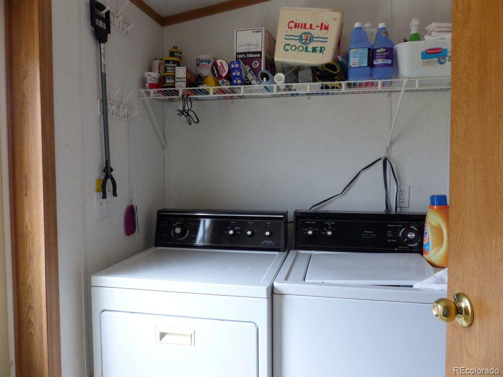 985 Prairie Road Westcliffe, CO 81252 - Photo 8 of 35 a room with storage and utility