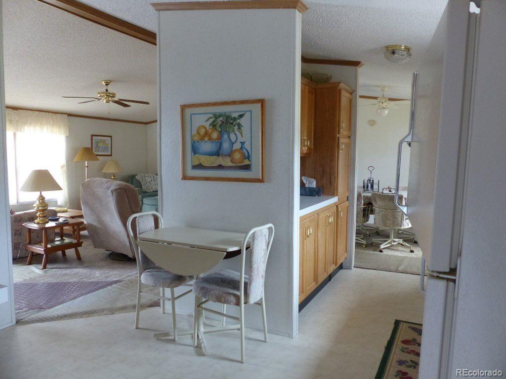 985 Prairie Road Westcliffe, CO 81252 - Photo 10 of 35 a workspace with furniture and window