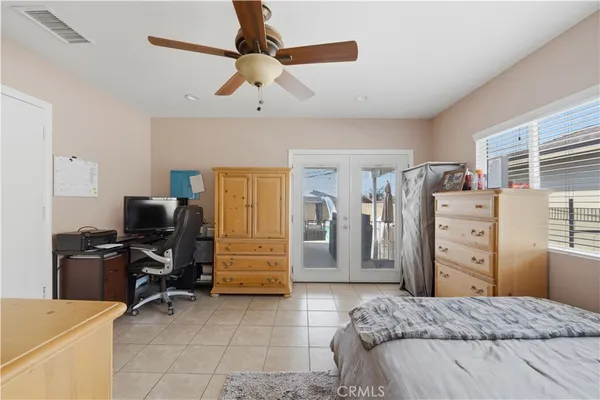 a bedroom with a bed and furniture