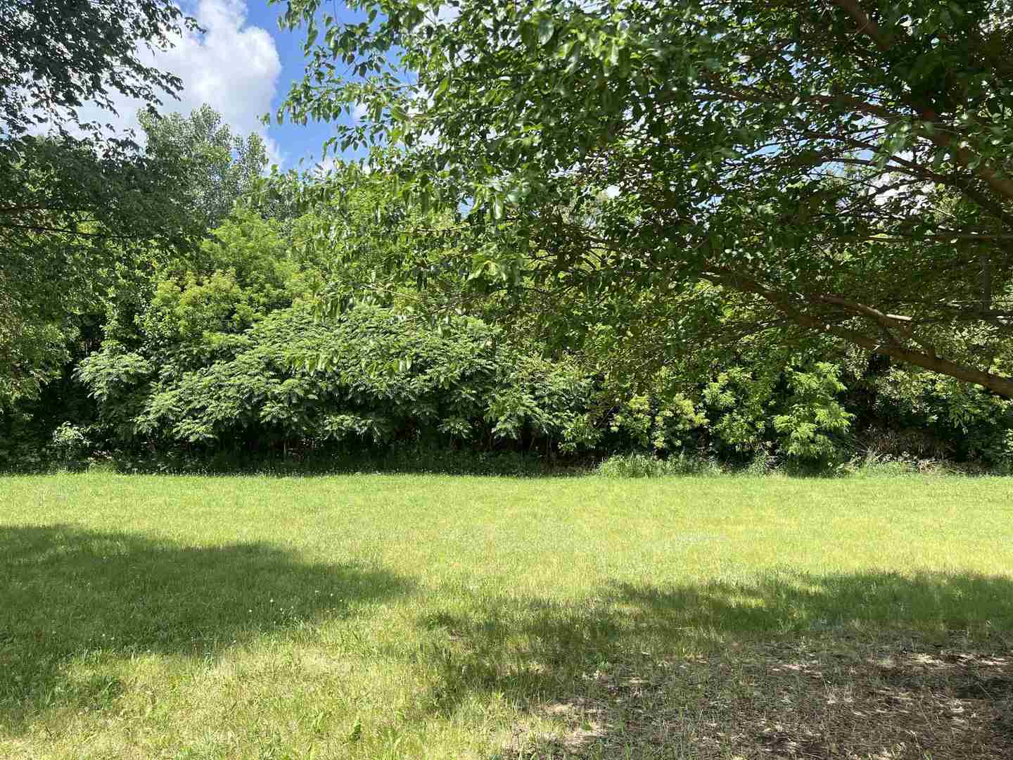 14358 Prairie Commons Lane South Beloit, IL 61080 - Photo 4 of 5 a view of a green yard