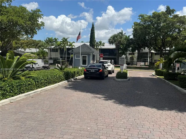 a view of street with parked cars