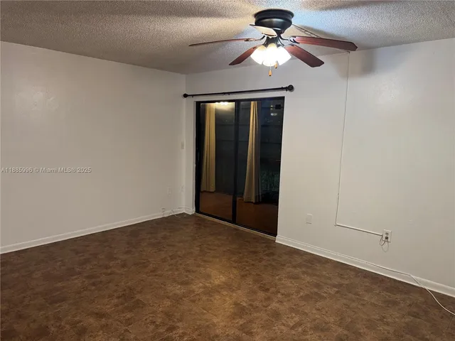 a view of a big room with carpet