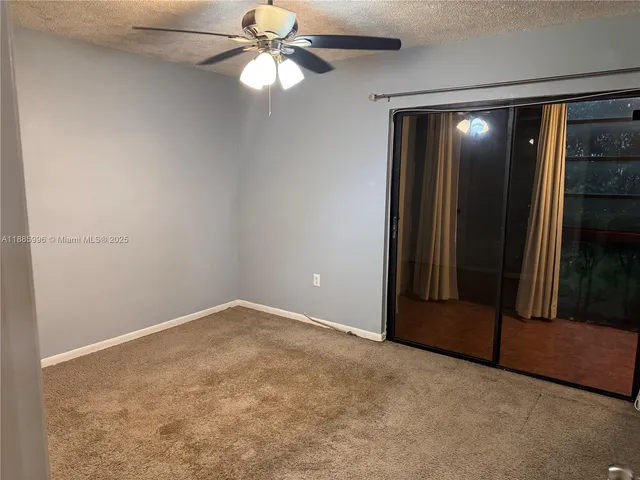 a bathroom with a toilet a sink and bathtub