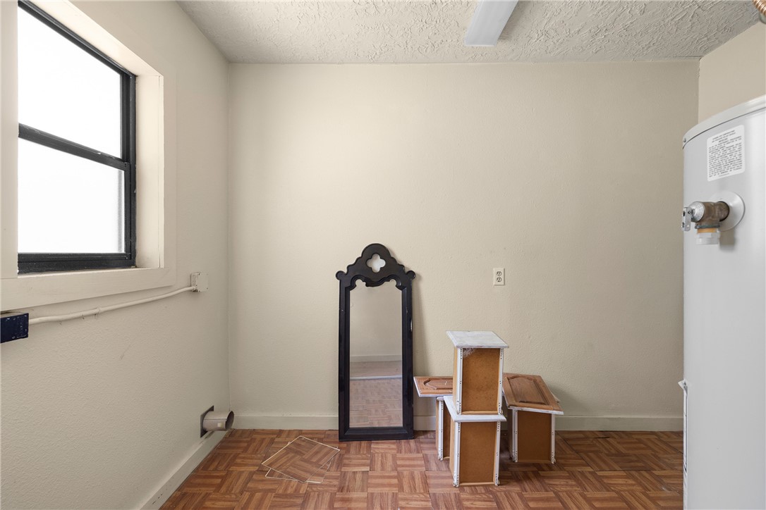 488 7th Street Somerville, TX 77879 - Photo 15 of 41 a view of a livingroom with wooden floor and a staircase