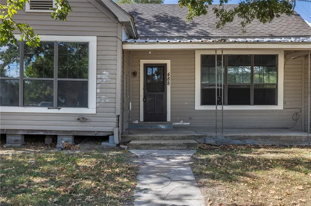 a front view of a house with a window