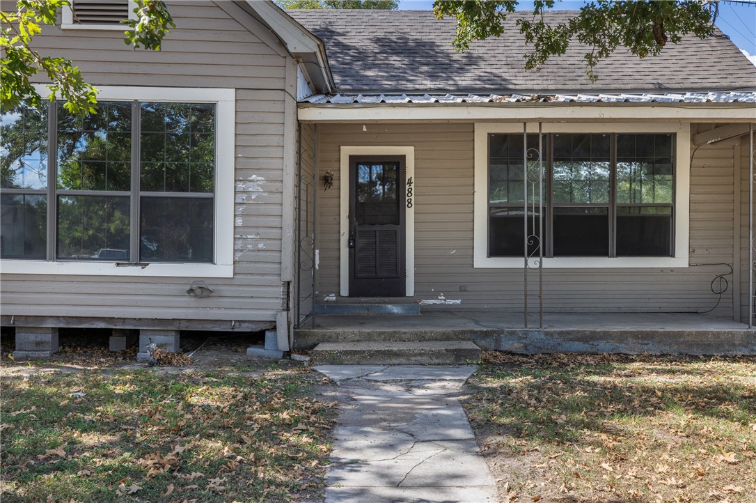488 7th Street Somerville, TX 77879 - Photo 31 of 41 a front view of a house with a window