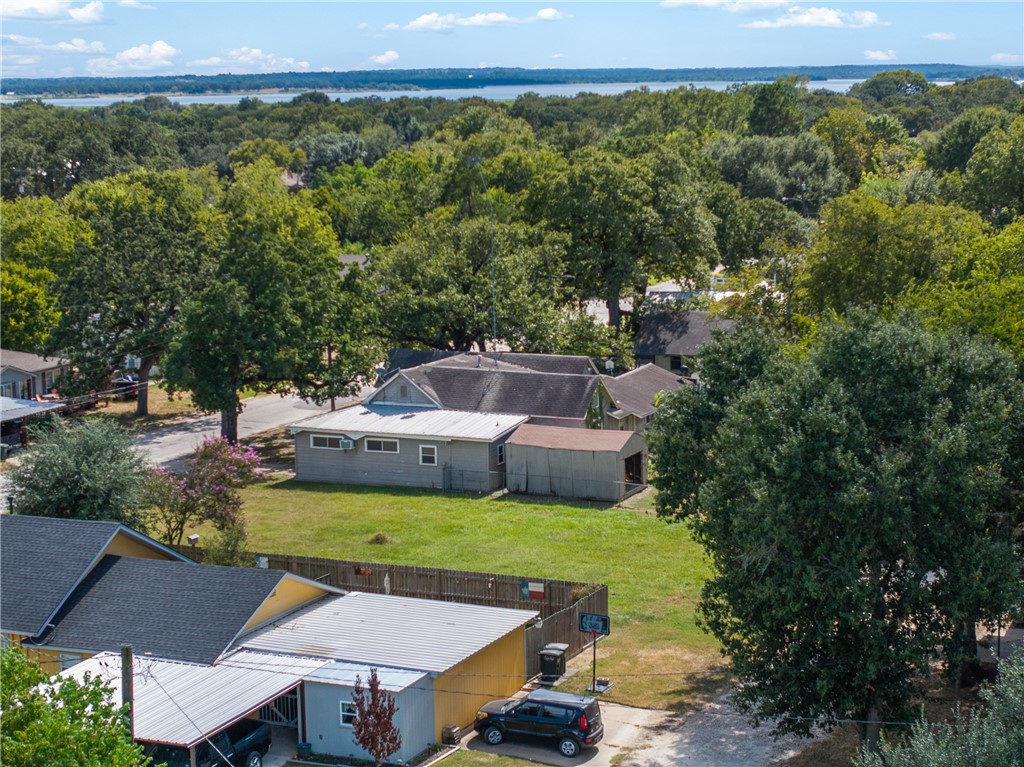 488 7th Street Somerville, TX 77879 - Photo 36 of 41 a view of a chairs and table on the patio