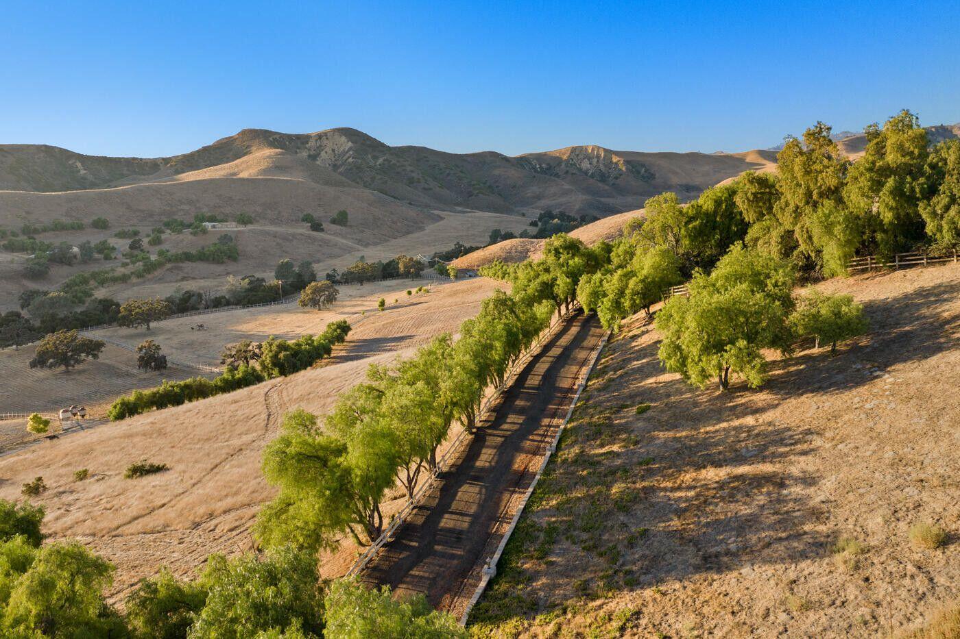 1750 Rambling Oaks Road Santa Ynez, CA 93460 - Photo 22 of 45 a view of a houses with a yard