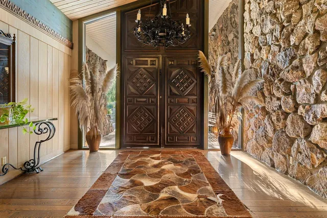 a outdoor space with patio furniture and a fireplace