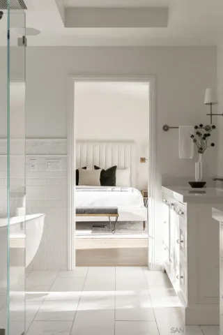 a kitchen with a sink a counter and cabinets