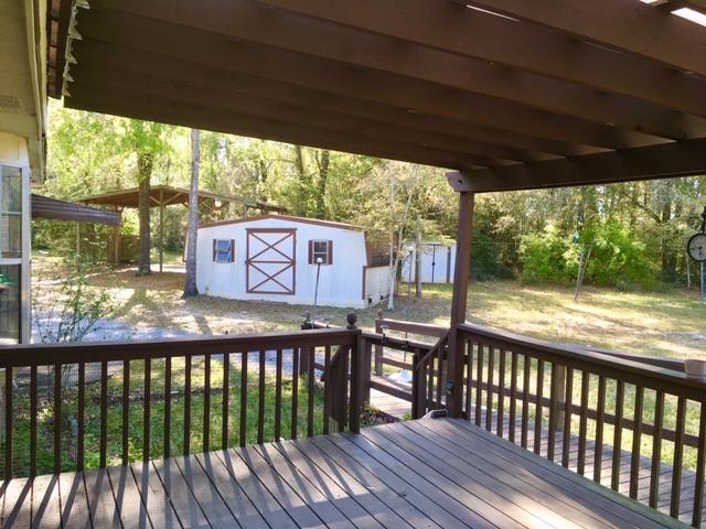 199 Ritzman Road DeFuniak Springs, FL 32433 - Photo 9 of 57 Covered Back Deck
