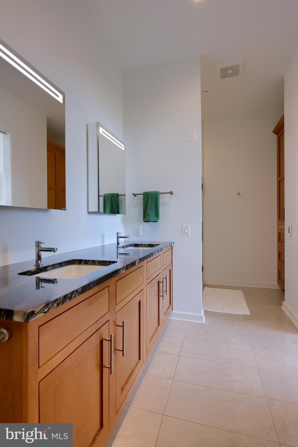 101 North Queen Street, Unit 404 Lancaster, PA 17603 - Photo 21 of 30 a kitchen with stainless steel appliances granite countertop a sink and cabinets