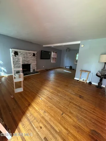 a view of a livingroom with a fireplace