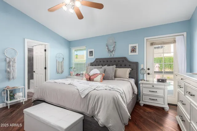 a bedroom with a bed and a dresser