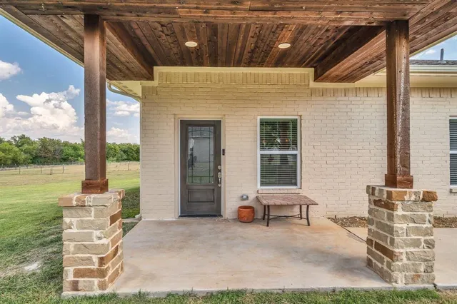 a view of front door and patio