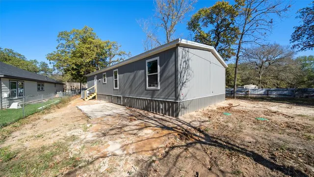a view of backyard of house