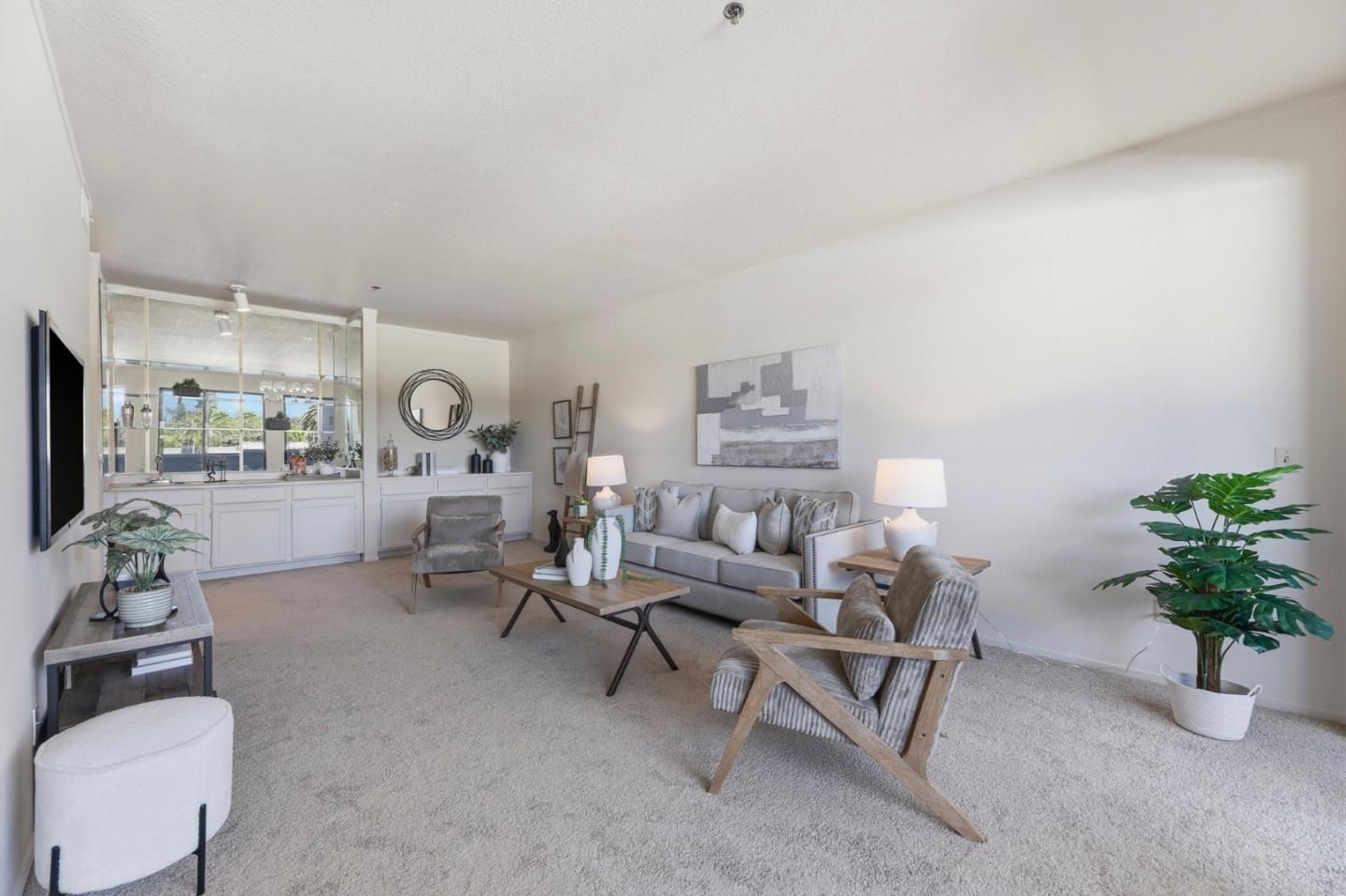 22330 Homestead Road, Unit 226 Cupertino, CA 95014 - Photo 8 of 38 a living room with furniture and a potted plant