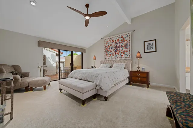 a bedroom with bed and window